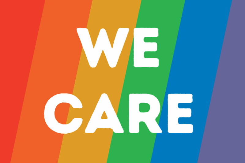 We Care text set on top of a rainbow